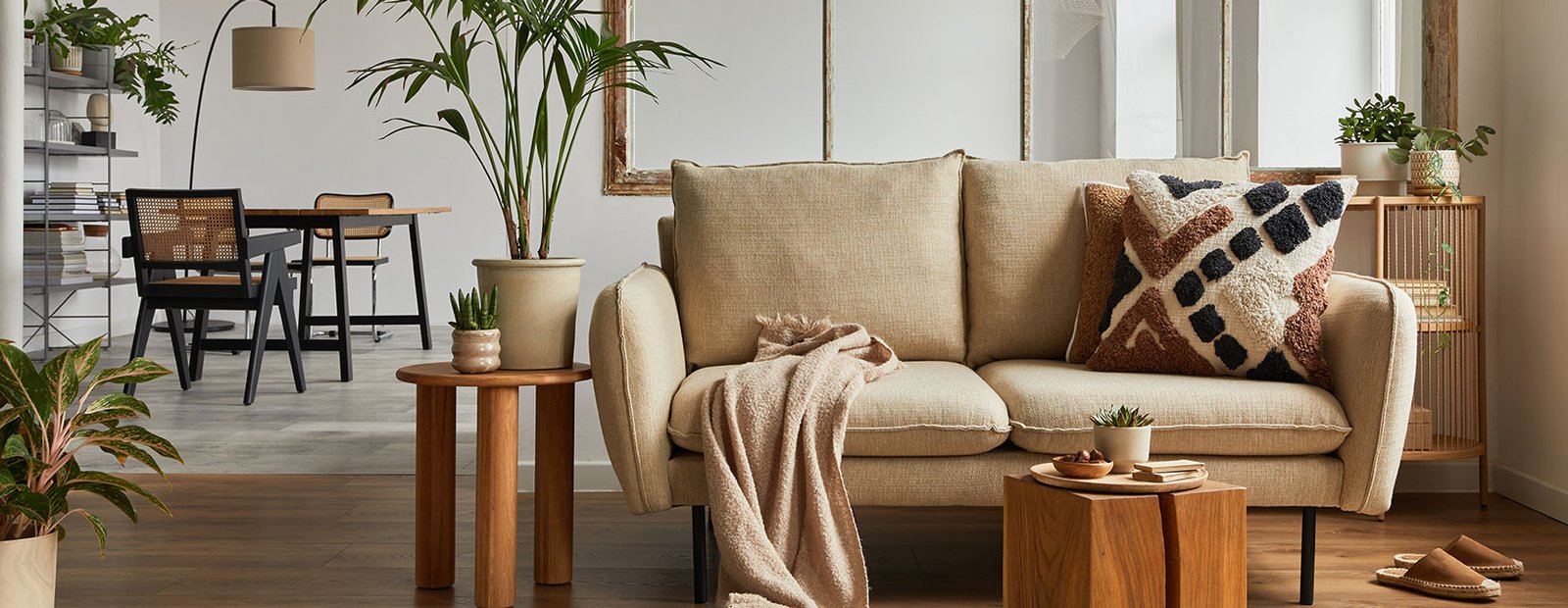 Interior designer answering client questions during initial consultation with design materials and portfolio