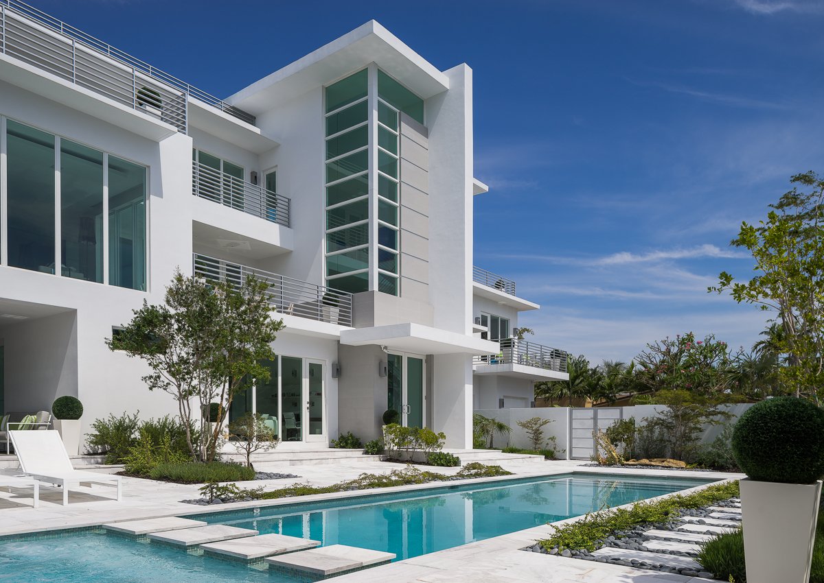 Luxury waterfront interior design in Fort Lauderdale by Shuster Design Studio featuring canal views